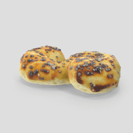 Булка с маком, покрытая сахарной глазурью